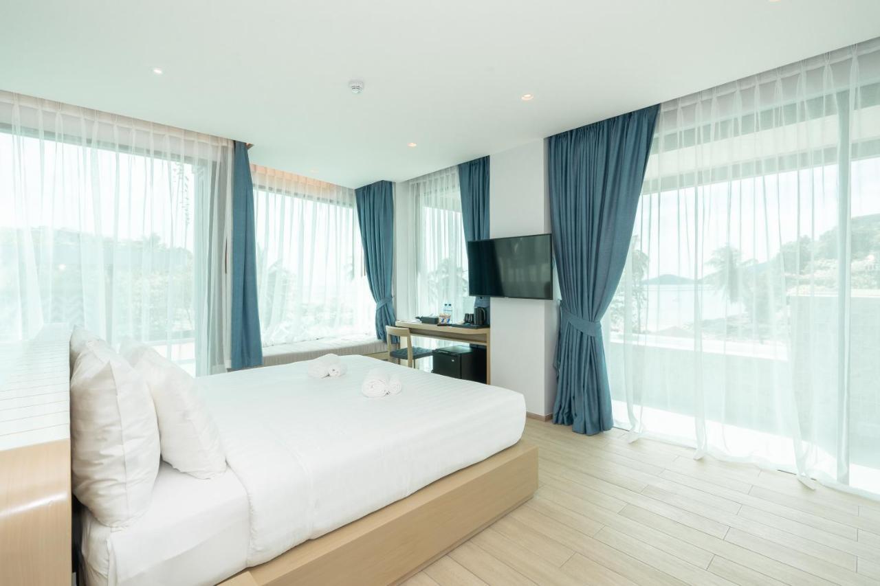 Panwaburi Beachfront Resort - Sha Extra Plus Bagian luar foto A bedroom at the hotel