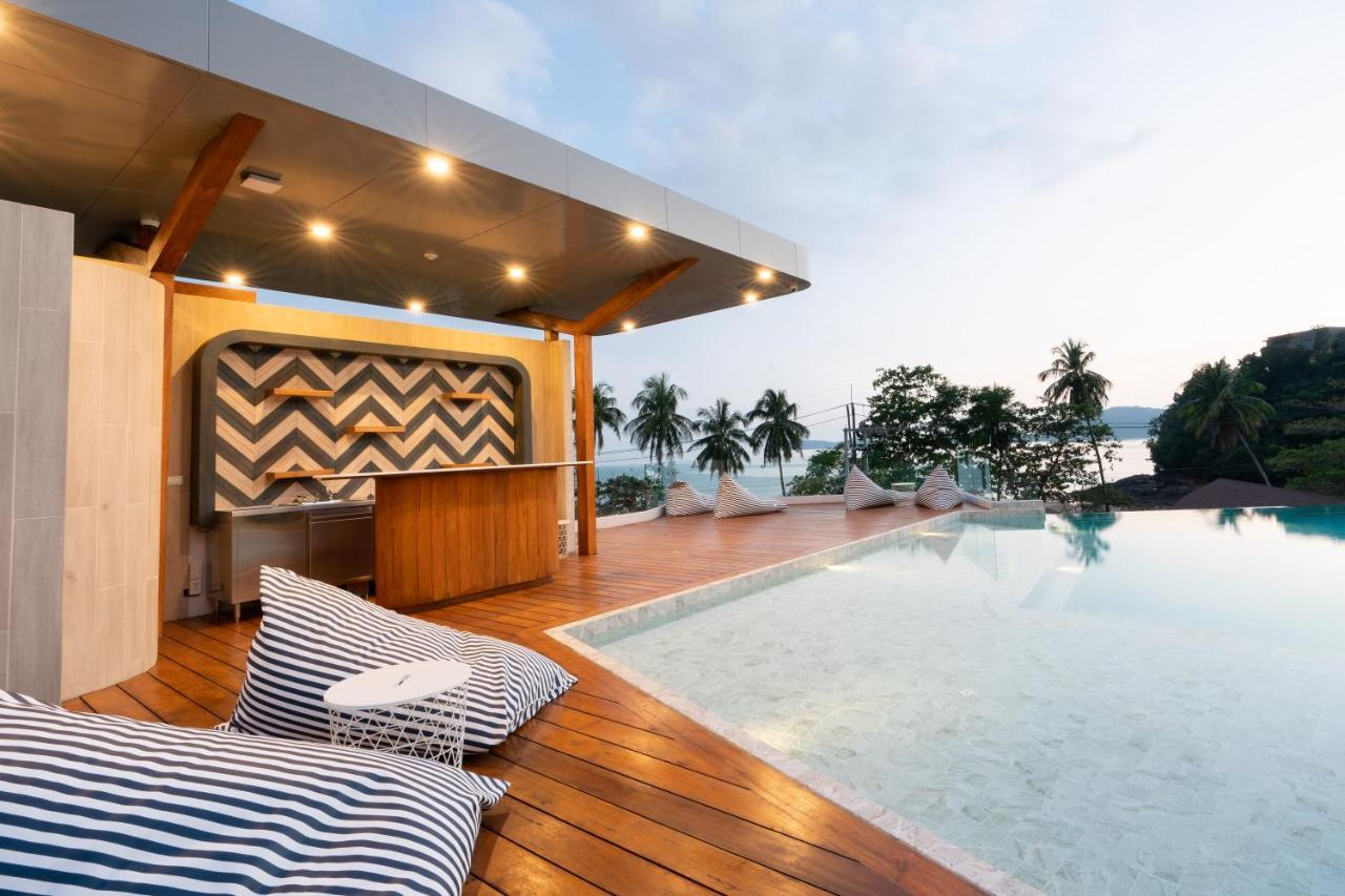 Panwaburi Beachfront Resort - Sha Extra Plus Bagian luar foto The pool at the hotel